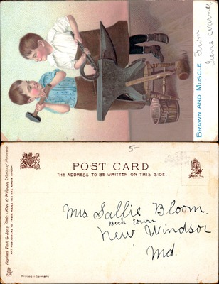 Two boys playing with toy anvil hammer Brawn and Muscle Tuck