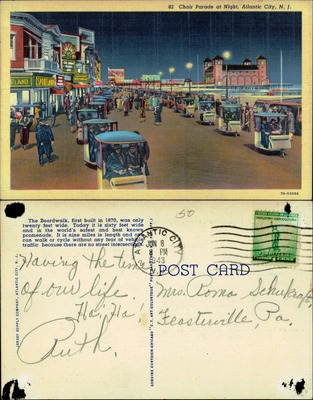 Chair Parade at night on Atlantic City boardwalk